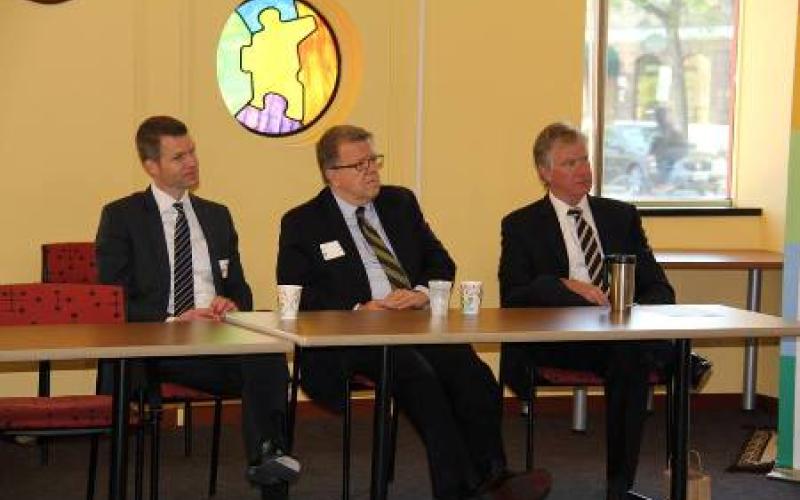 Saint Paul Mayor Chris Coleman and others seated at a table