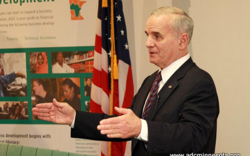 Minnesota Governor Mark Dayton gestures at the podium