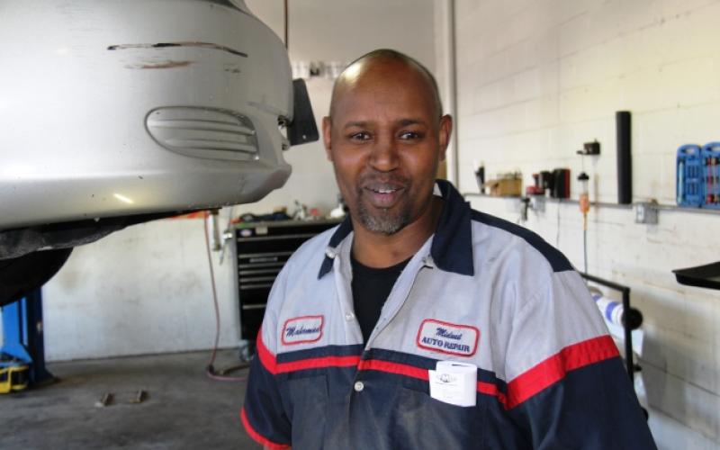 Mohamud Ali in his shop at Midwest Auto Repair