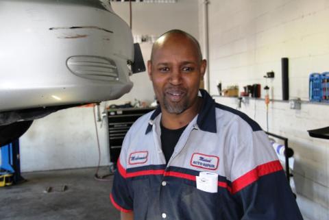 Mohamud Ali in his shop at Midwest Auto Repair